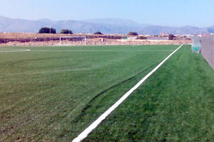 το Ικάριο γήπεδο, στη δημοτική έκταση στη θέση Ρουσές της Νέας Αλικαρνασσού