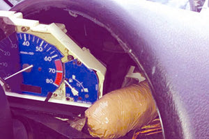 Έκρυβε την ηρωίνη πίσω από το κοντέρ