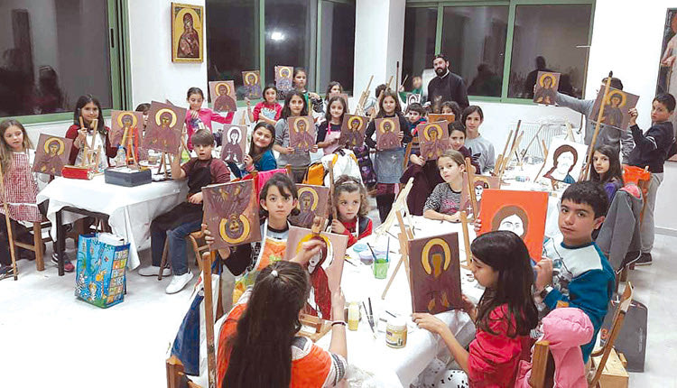  το Πολιτιστικό κέντρο της Ι. Μητρόπολης Γορτύνης και Αρκαδίας  με τον τότε νεαρό ιεροδιάκονο π. Αρσένιο Προκοπάκη