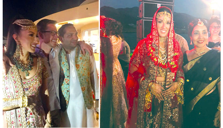 Το ζευγάρι των νεόνυμφων με παραδοσιακές φορεσιές 