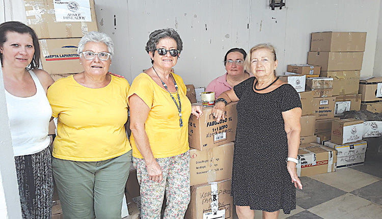 η περισυλλογή ειδών πρώτης ανάγκης, ειδών υγιεινής, φαρμάκων και τροφίμων μακράς διάρκειας για τα θύματα της Ανατολικής Αττικής στο Πολύκεντρο Νεολαίας