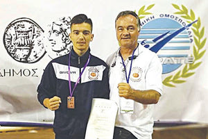 Ο Μπόκας με τον προπονητή του