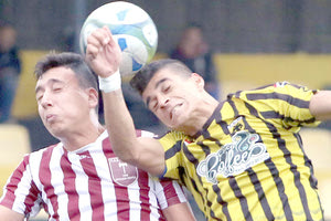 Στιγμιότυπο από το παιχνίδι της ΑΕΚ με τη Μινωική.