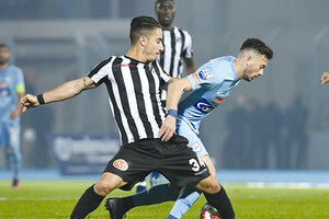 Κοροβέσης και Αθανασιάδης σε στιγμιότυπο από το ματς του πρώτου γύρου