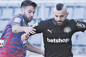 Ο Ουές με τον Φεράρι από το παιχνίδι στο Βόλο