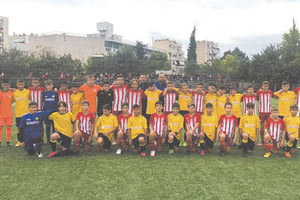 Τα παιδιά του Εργοτέλη με τους μικρούς του Ολυμπιακού