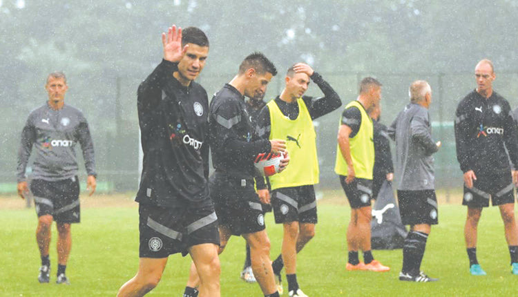 προπονηση υπο βροχη οφη