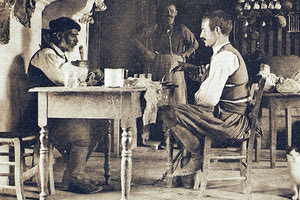 Σε καφενείο της Αγίας Βαρβάρας το 1919 (φωτογραφία Daniel Baud και Frederic Boissonas)