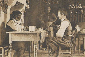 ΦΩΤΟΗΜΕΡΑΣ: Σε καφενείο στην Αγ. Βαρβάρα στις αρχές του περασμένου αιώνα. Φωτογραφία του 1919 Fr. Boissonass