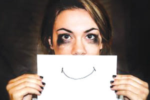 κακοποιημένη γυναίκα 