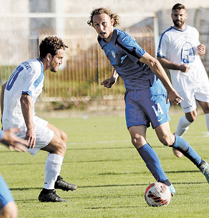   Ο Ζιώγας με τον Διμούτσο σε φάση από το παιχνίδι