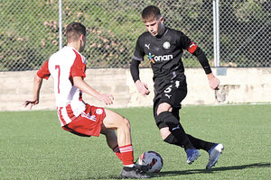 Φάση από το παιχνίδι του ΟΦΗ με τον Ολυμπιακό