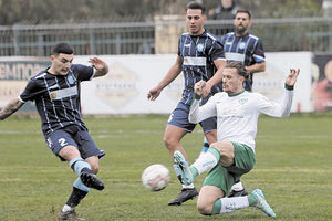 Στιγμιότυπο από το συναρπαστικό ντέρμπι που έγινε στις Αρχάνες με τελικό νικητή τον Πόρο