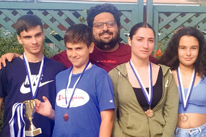 Ο προπονητής του “Ηράκλειο” Ο.Α.Α. με τους αθλητές στο Final4 του Ομαδικού