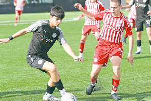 Φάση από το ματς των ομάδων Κ15 ΟΦΗ - Ολυμπιακός