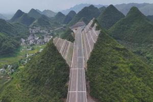 Η Κίνα φτιάχνει την ψηλότερη γέφυρα του κόσμου κόβοντας βουνά στα δύο (vid)